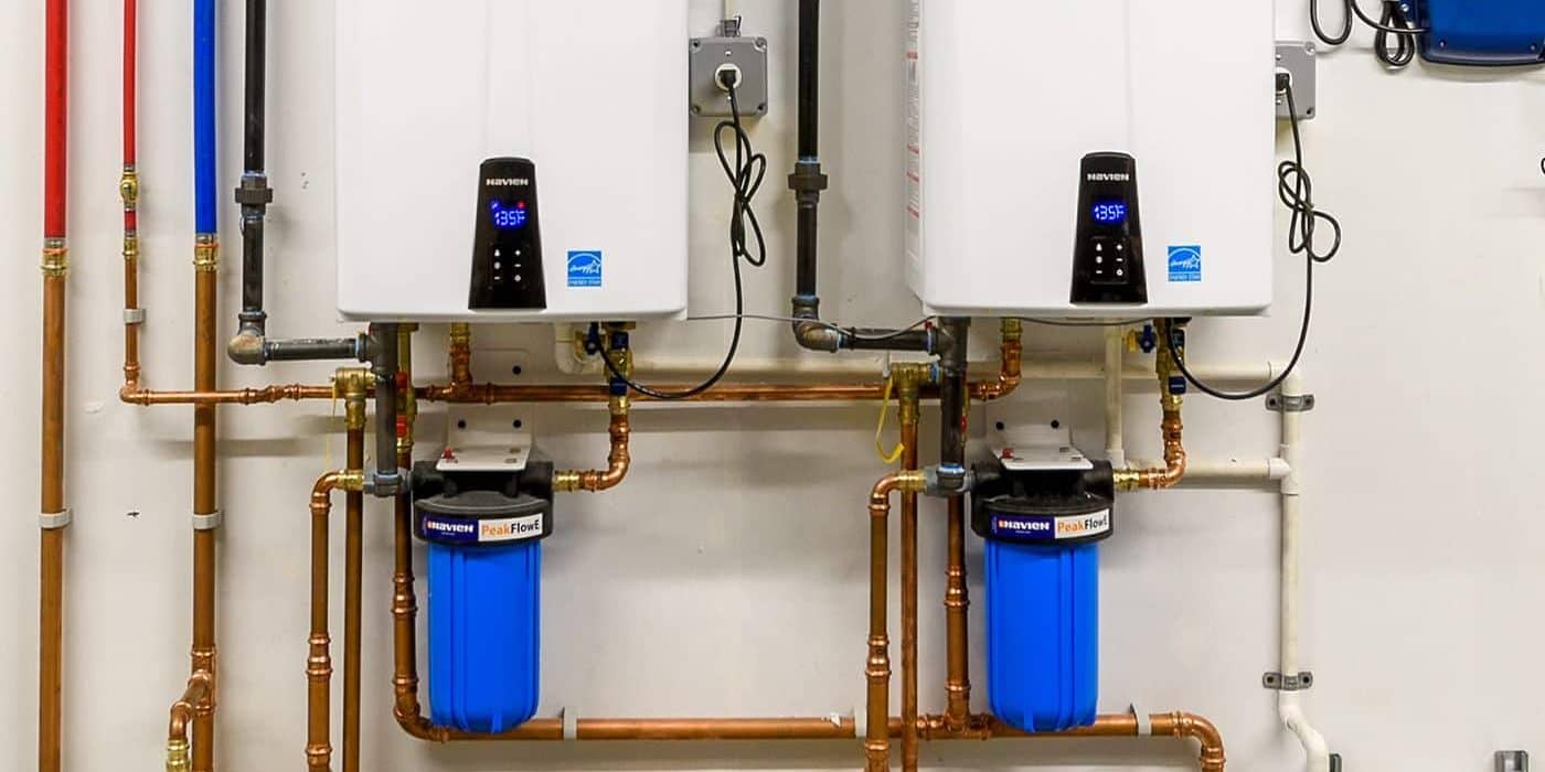 Two Navien tankless water heaters installed to provide hot water on-demand in Austin, TX.